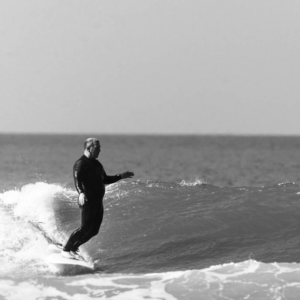 Devon artist Steve PP surfing at Woolacombe beach