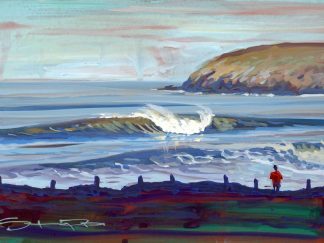 Surfer watching the waves at Croyde beach Devon