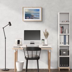 sunshine and tonic print hanging on the wall in a home study