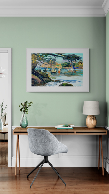 Watermouth cove painting in a white frame on a green wall