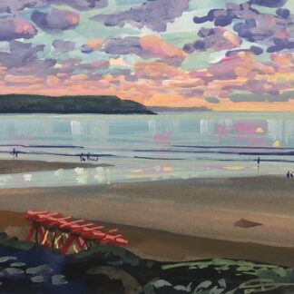 Swingboats at sunset on woolacombe beach
