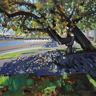 Leaning Conker tree held up by a helping hand sculpture on bideford quay with the old town bridge crossing the river to ridge visible in the distance