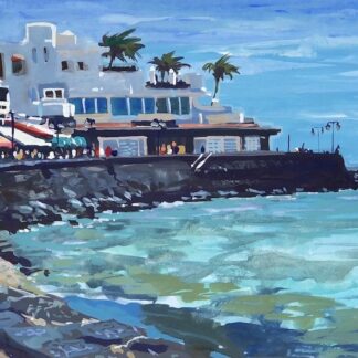sunny promenade in Playa Blanca Lanzarote, turquoise ocean