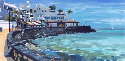 sunny promenade in Playa Blanca Lanzarote, turquoise ocean
