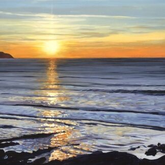golden sunset seascape with waves breaking on Woolacombe beach