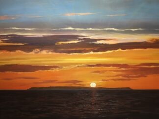 golden sunset going down behind Lundy