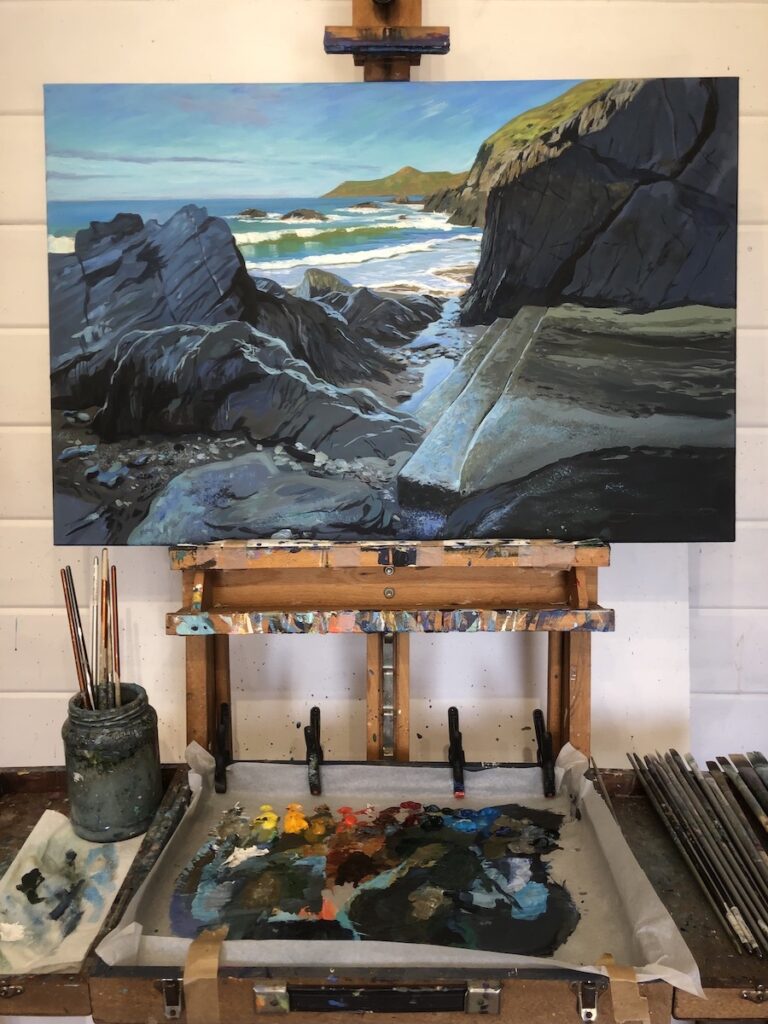 Steps To The Sea. Original Combesgate Beach painting by Woolacombe artist Steve PP on an easel . Devon landscape paintings. Available from the Woolacombe art studio