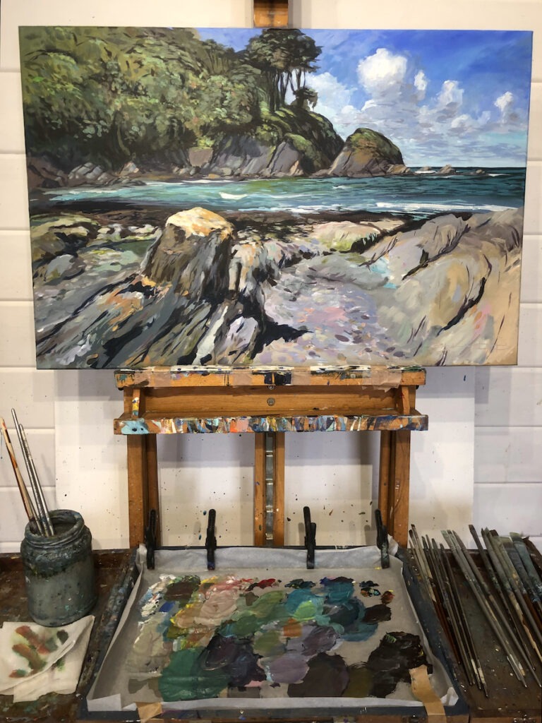 original Lee Bay painting by Woolacombe artist Steve PP on an easel in the artists studio