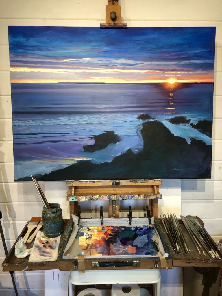 Longshore Drift Original Woolacombe sunset Painting on an easel in the art studio by artist Steve PP